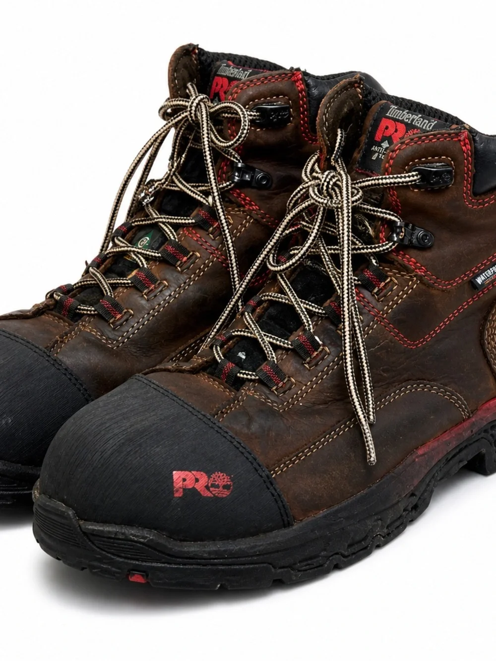 Timberland PRO Men's Brown Leather Work Boots with Black Toe and Red Accents